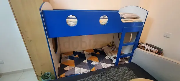 Blue childrens bunk bed with ladder - good condition