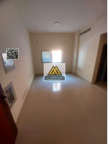 Studio for annual rent in Al Rashidiya 2, Ajman, behind Falcon Towers, new family-only building. Separate kitchen, central AC, good finishing, AED 18,