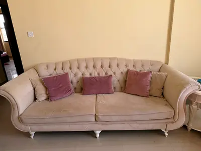 Beige 3-Seater Tufted Sofa with Throw Cushions and Pink 2-seater Tufted Sofa with Throw Cushions
