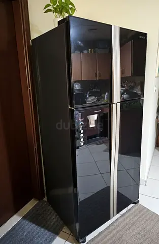 Black Hisense Side-by-Side Refrigerator with Water Dispenser - Good Condition