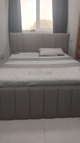 Grey upholstered double bed with storage, good condition brand Ikea