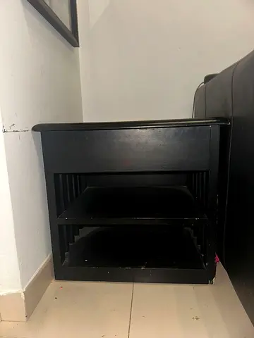Used small black wooden bedside table / side table with shelves
