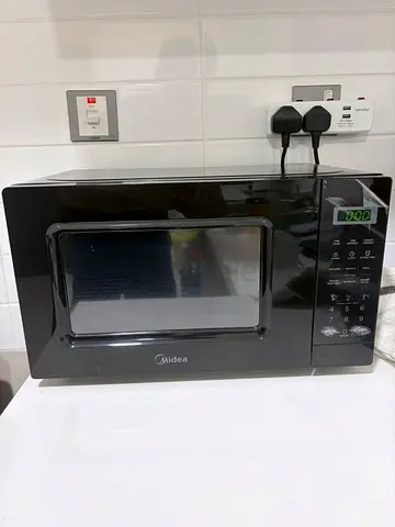 Midea Black Countertop Microwave Oven - Good Working Condition