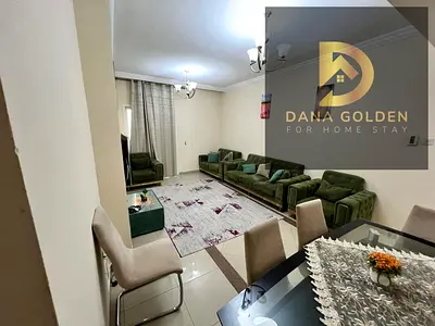 Two bedrooms, a living room, a maid's room, three bathrooms, and two balconies, fully furnished with internet, for monthly rent in Sharjah, Al Taawun