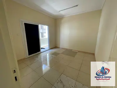 One bedroom and living room for rent in Al Qasimia Station with a balcony, neat finishing, prime location near Lulu Hypermarket, Nesto supermarket, an