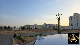 Commercial land in Al-Aliya, opposite Al-Bahia | Permit G+5 | Strategic location and open parking