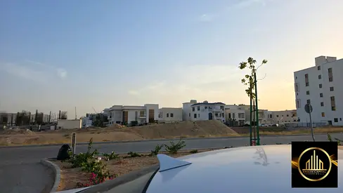 Commercial land in Al-Aliya, opposite Al-Bahia | Permit G+5 | Strategic location and open parking