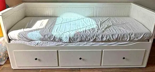 IKEA Hamnes Day bed with 3 storage drawers underneath and with 2 IKEA mattresses