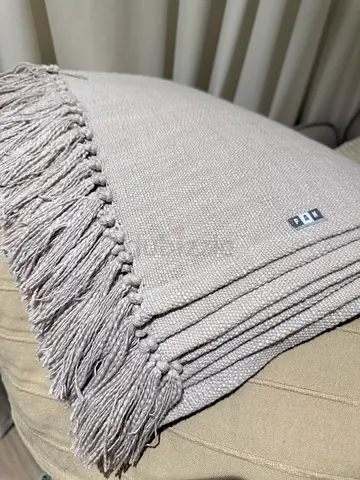 Ivory cotton throw with fringers