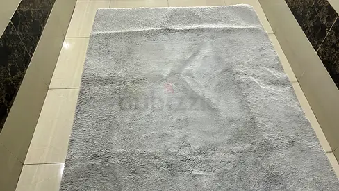 Light grey soft fur rug