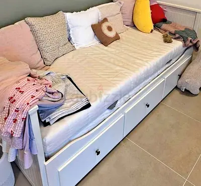 IKEA Hamnes Day bed with 3 storage drawers underneath and with 2 IKEA mattresses