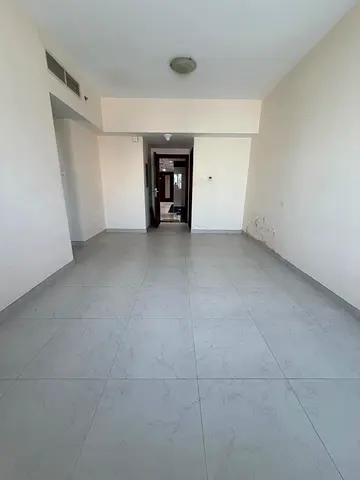 A well-located apartment is available for annual rent in Al Taawun on the main road and close to the Dubai bus station. The property is situated in a
