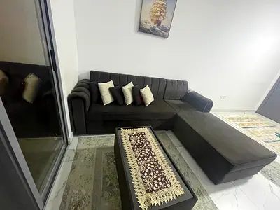 L-shaped dark chocolate fabric sofa with chaise (good condition)