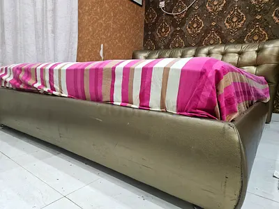 King-size upholstered bed with tufted headboard — good condition