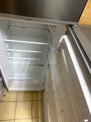 Used stainless steel refrigerator - good working condition