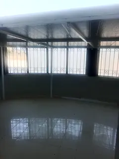For annual rent in Ajman, a one-bedroom apartment with a living room, balcony, and two bathrooms is