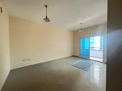 Free parking, 2BR hall with wardrobes, balcony &amp; great view in Al Majaz 2.