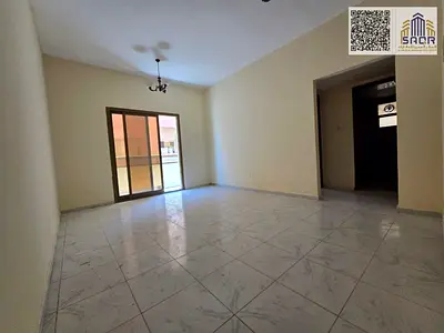 Distinctive Apartment for Annual Rent in Ajman - Strategic Location and Comfortable Spaces