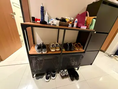Industrial-style shoe rack with storage shelves - good condition