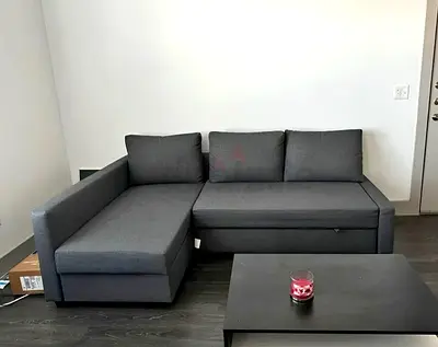 Ikea Gray L shape Sofa bed available in perfect condition