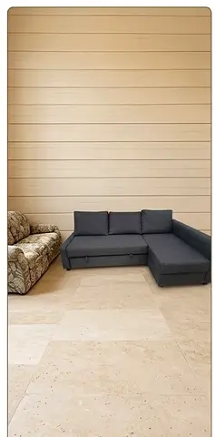 Right-side grey L-shaped sofa bed in good condition