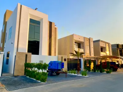 Villa for sale with a distinctive modern design | Registration and ownership fees included | Close to Mohammed Bin Zayed Road and Emirates Road | Clos