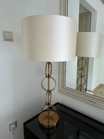 Two lamps Roth a gold circular base from the White Velvet brand