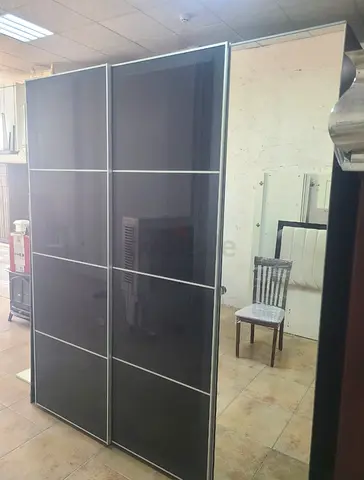 Large Sliding Door Wardrobe with Black Glass Panels