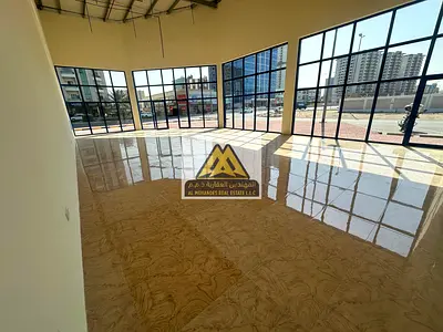 Corner Commercial Shop for Annual Rent in Musherif Ajman Prime Location Large Space