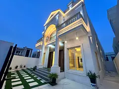 Luxury corner villa with a very large yard, close to all services, near Sheikh Mohammed Bin Zayed Ro