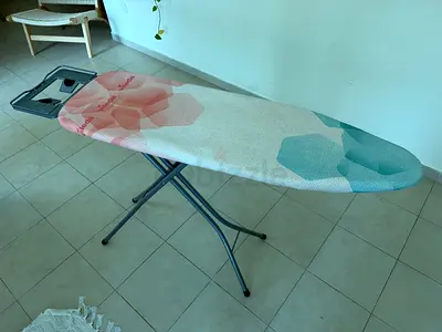 Ironing board in good condition with new cover - NO OFFERS
