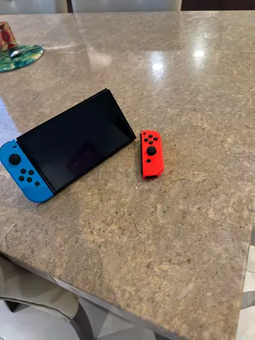 Nintendo Switch Console with Neon Blue/Red Joy-Cons - Good Condition