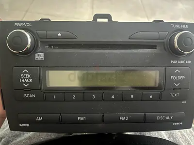 Used Toyota/Universal Car Stereo Head Unit (CD, AM/FM, AUX) - Good Working Condition