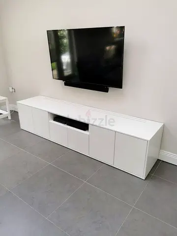Custom Made Modern TV Console with Floating Cabinet and Minimalist Wall Design