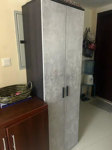 Two-door freestanding shoe rack in good condition