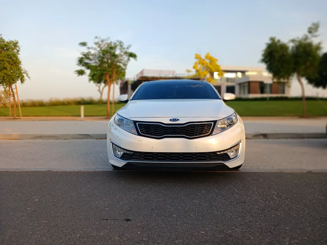 Kia K5 2011 — photo 1 of 10
