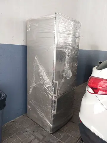 Tall stainless refrigerator/freezer - wrapped and ready (used)