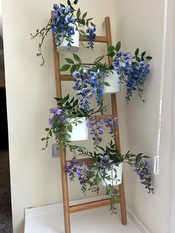 Decorative staircase arrangement with silk flowers