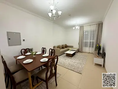 Luxury one-bedroom apartment with a balcony and open views. Ajman, Jasmine Towers. Fully furnished, available for monthly rent.