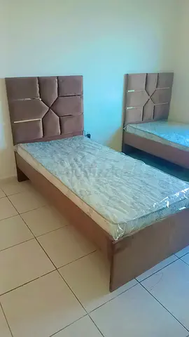 Pair of single beds with headboards and mattresses - good condition