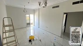 Two bedrooms, a living room, three bathrooms, a balcony with an open view overlooking Sheikh Mohamme