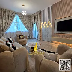Furnished one-bedroom apartment with brand new hotel-style furniture for monthly rent in Ajman - Al
