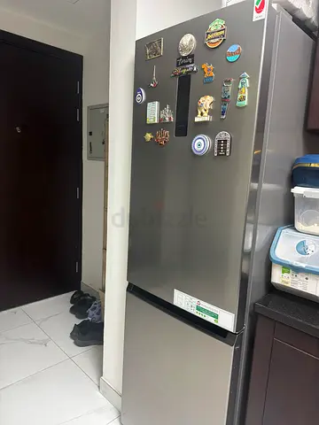 Silver Double-Door Refrigerator in Good Condition