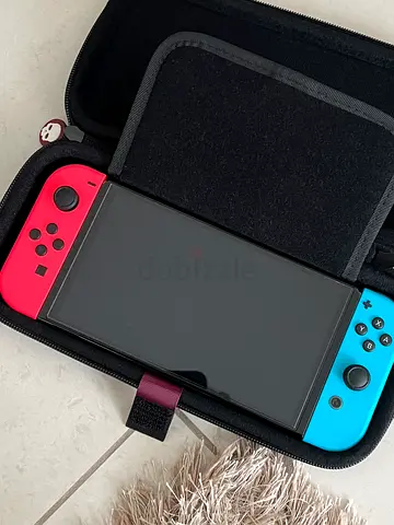 Nintendo Switch OLED + Games