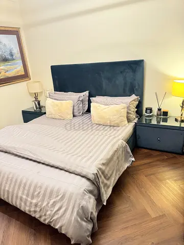 THE ONE - King bed frame with upholstered headboard, mattress and 2 side tables.
