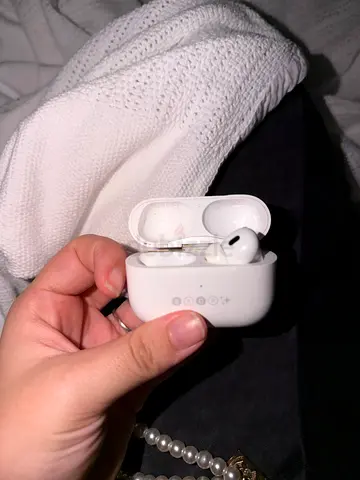 AirPods Pro 2 white wireless earbuds with charging case