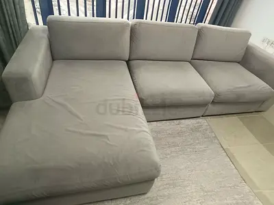 Light grey L-shaped 3-seater sofa with chaise