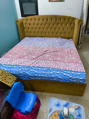 King-size upholstered bed with tufted headboard - good condition