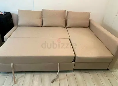 Ikea L Shape Sofa cum bed with big storage in L