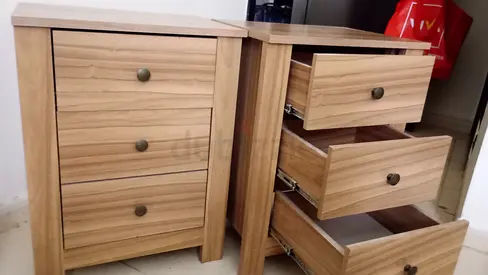 Pair of wooden bedside/side drawer cabinets - light oak finish